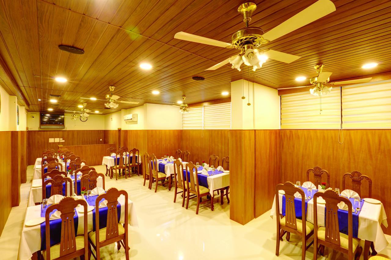 Hotel Floral Park Kottayam Esterno foto
